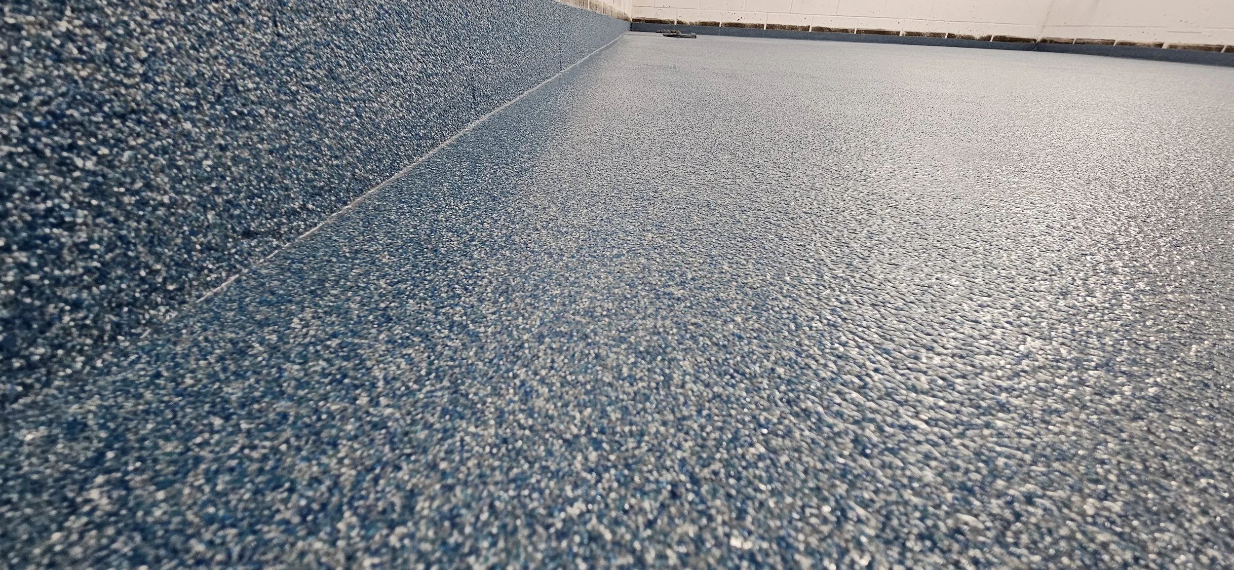 Finished in Caribbean Anti-Slip Quartz Stone.