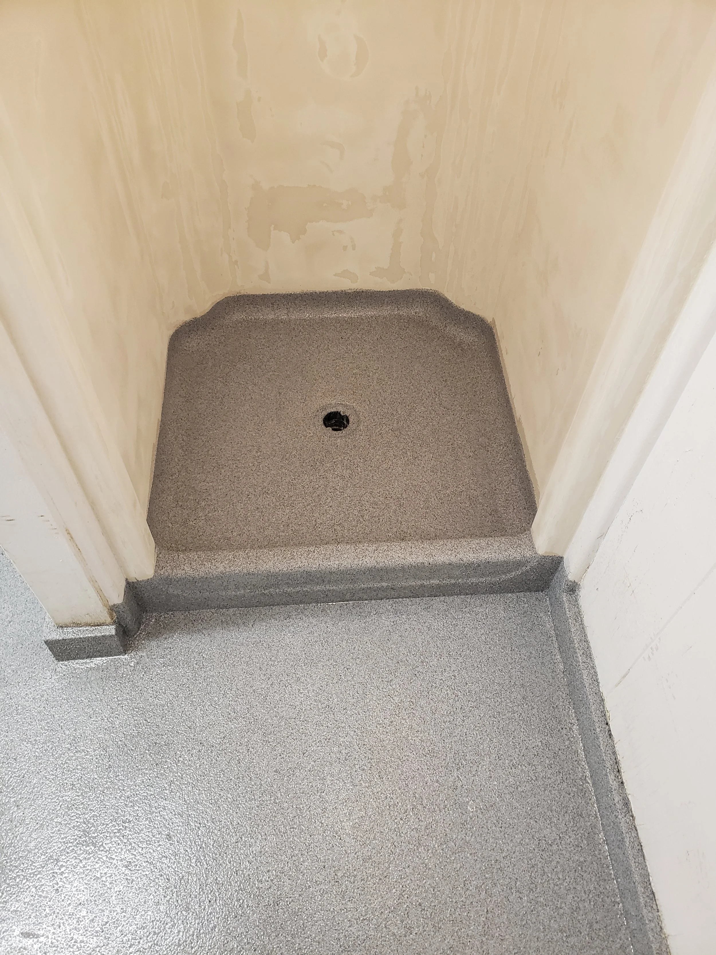 Finished in Dalmatian Anti-Slip Quartz Stone.