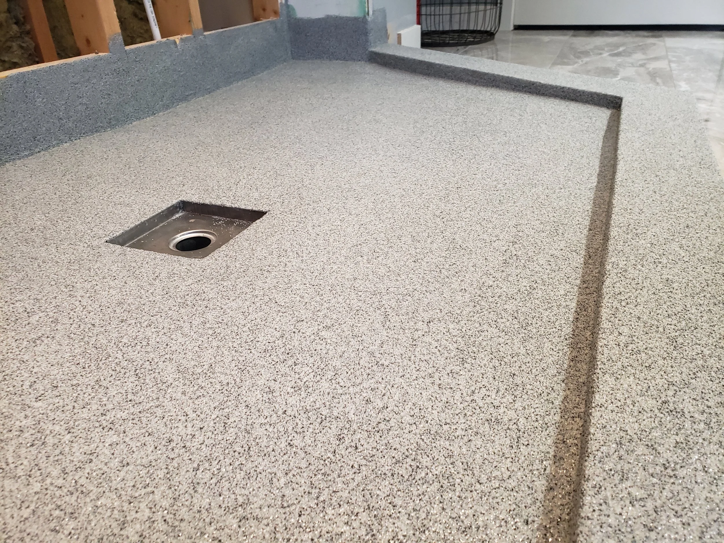 Finished in Pepper Frost Anti-Slip Quartz Stone.