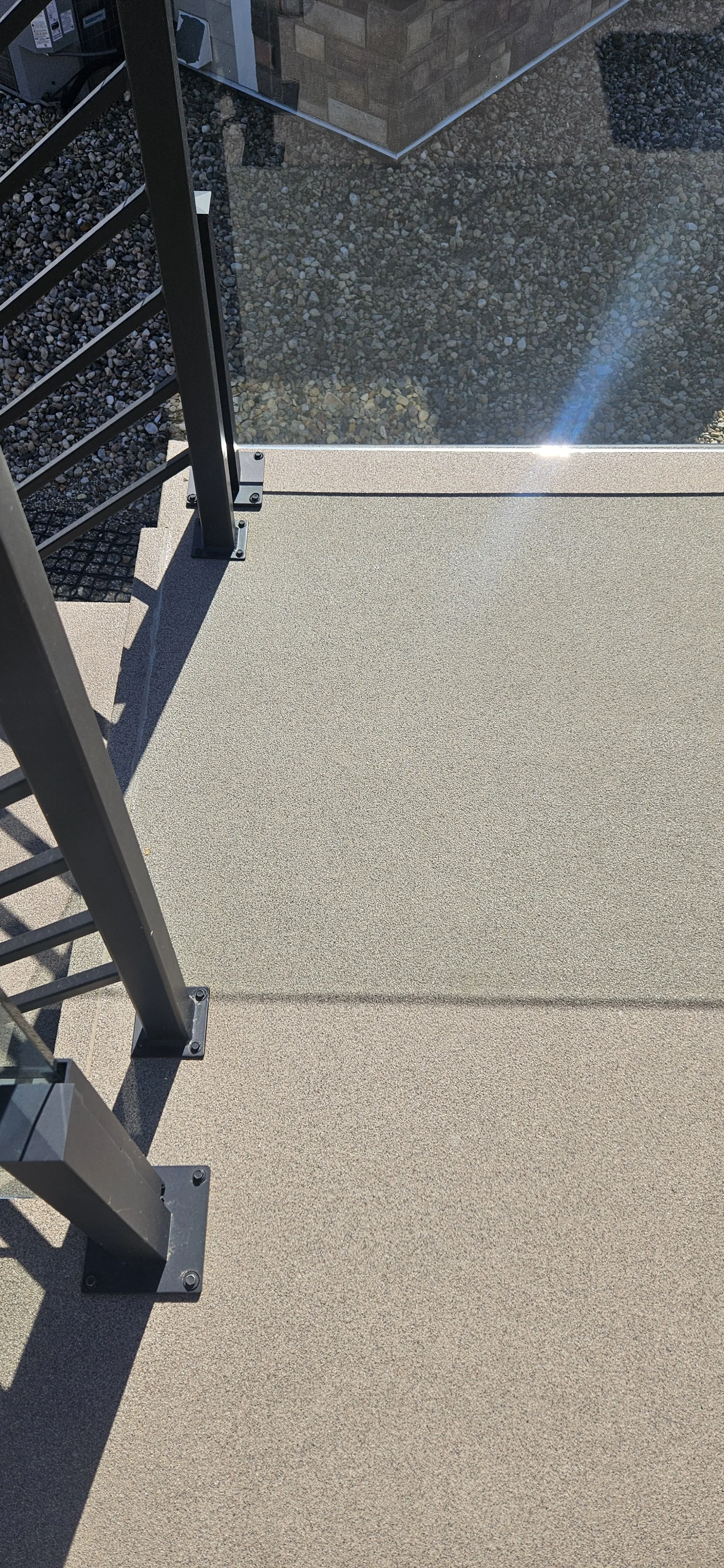 Finished in Toffee Anti-Slip Quartz Stone.
