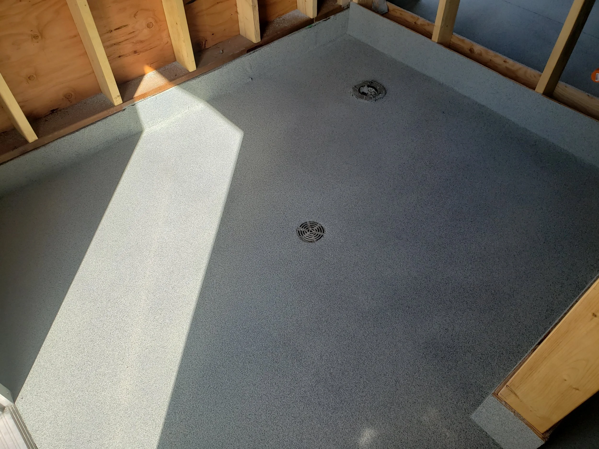 Provincial park showers and change rooms finished in anti-slip polyaspartic quartz stone. Perfect for wet surfaces. 