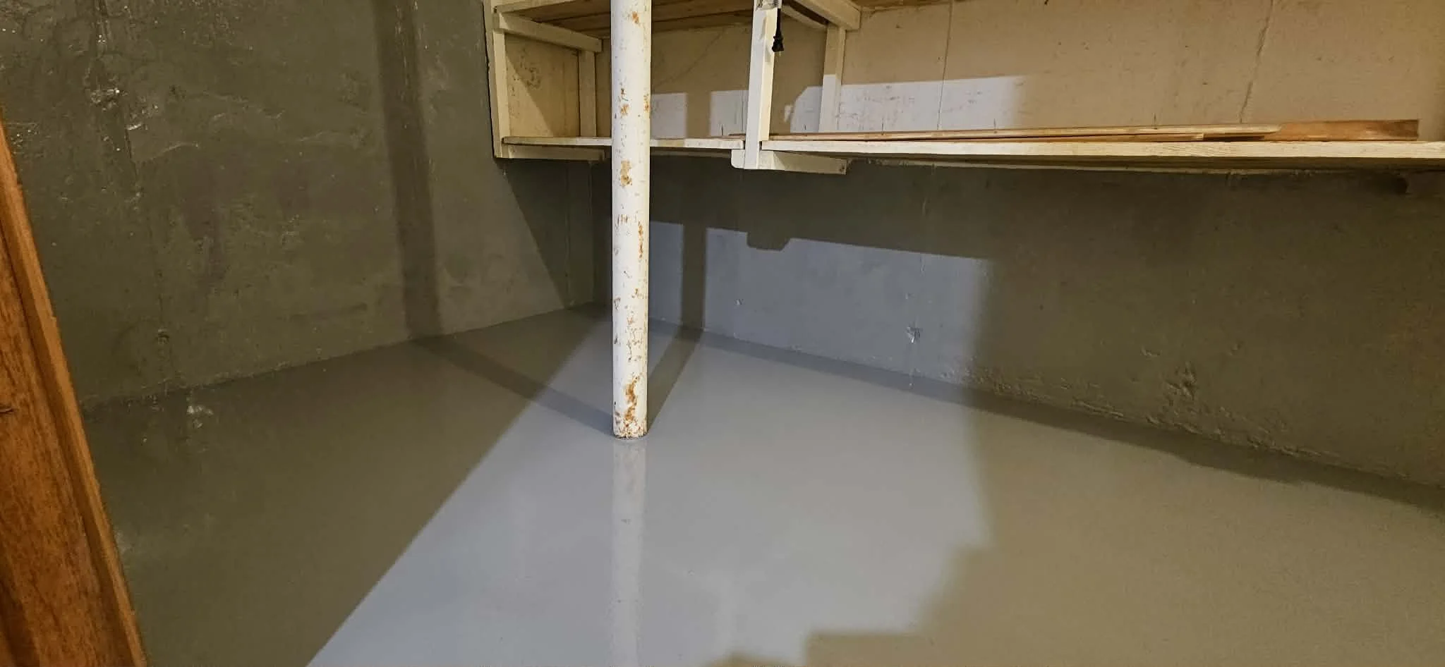AFTER - Walls and floor finished in Solid Base Grey.