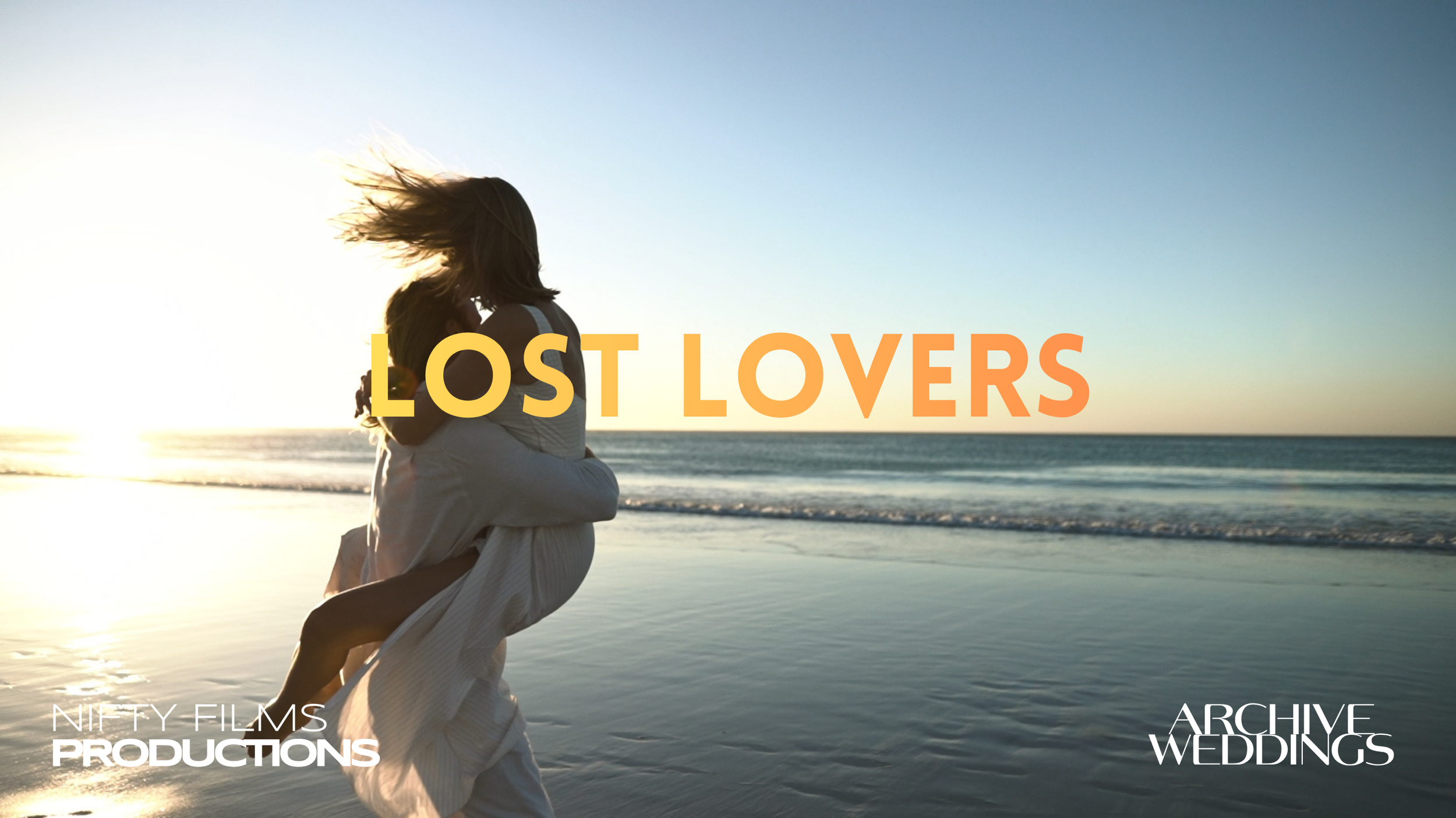 A couple is embracing and kissing on the beach during sunset.