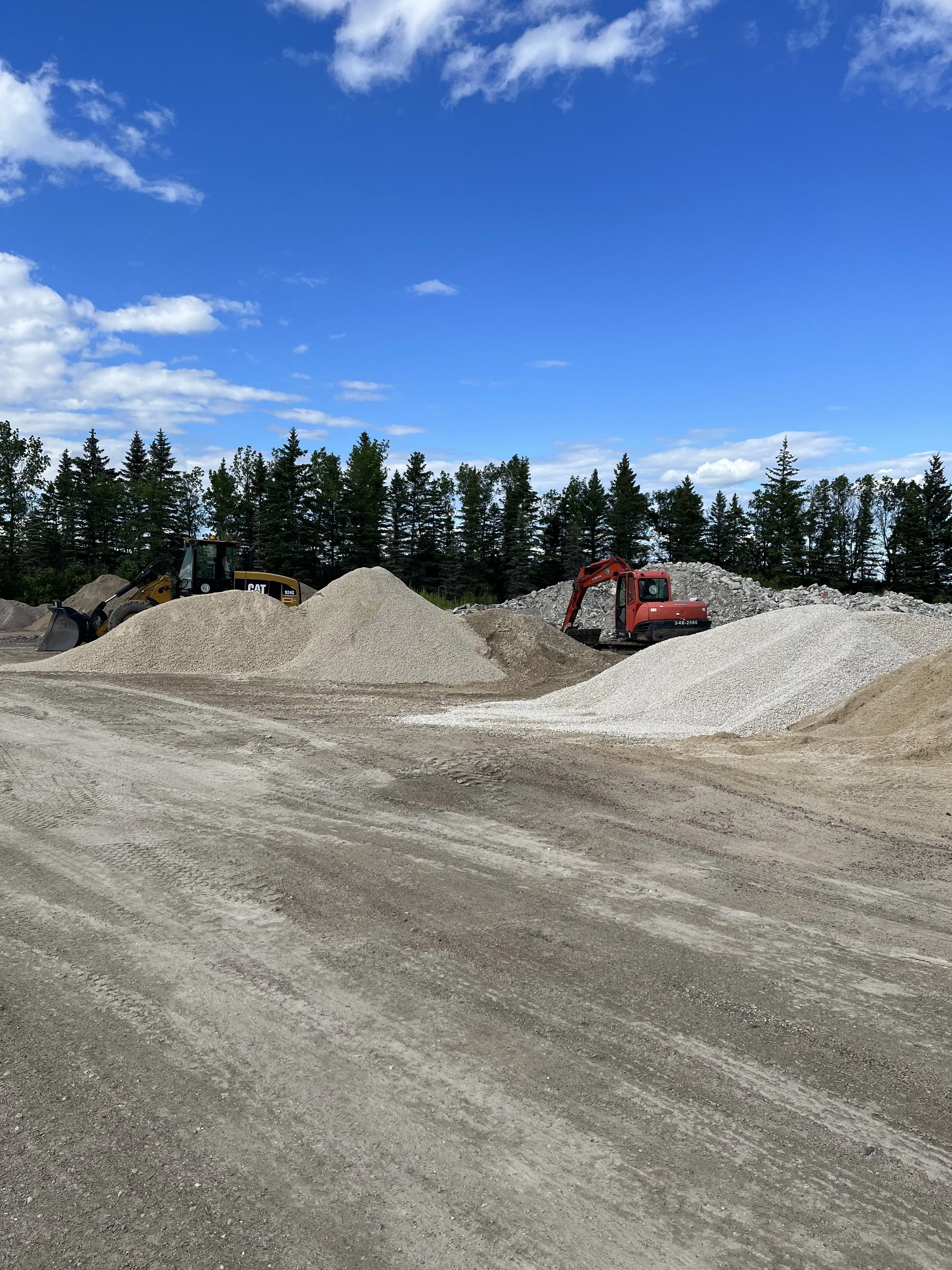 Limestone Piles + Equipment