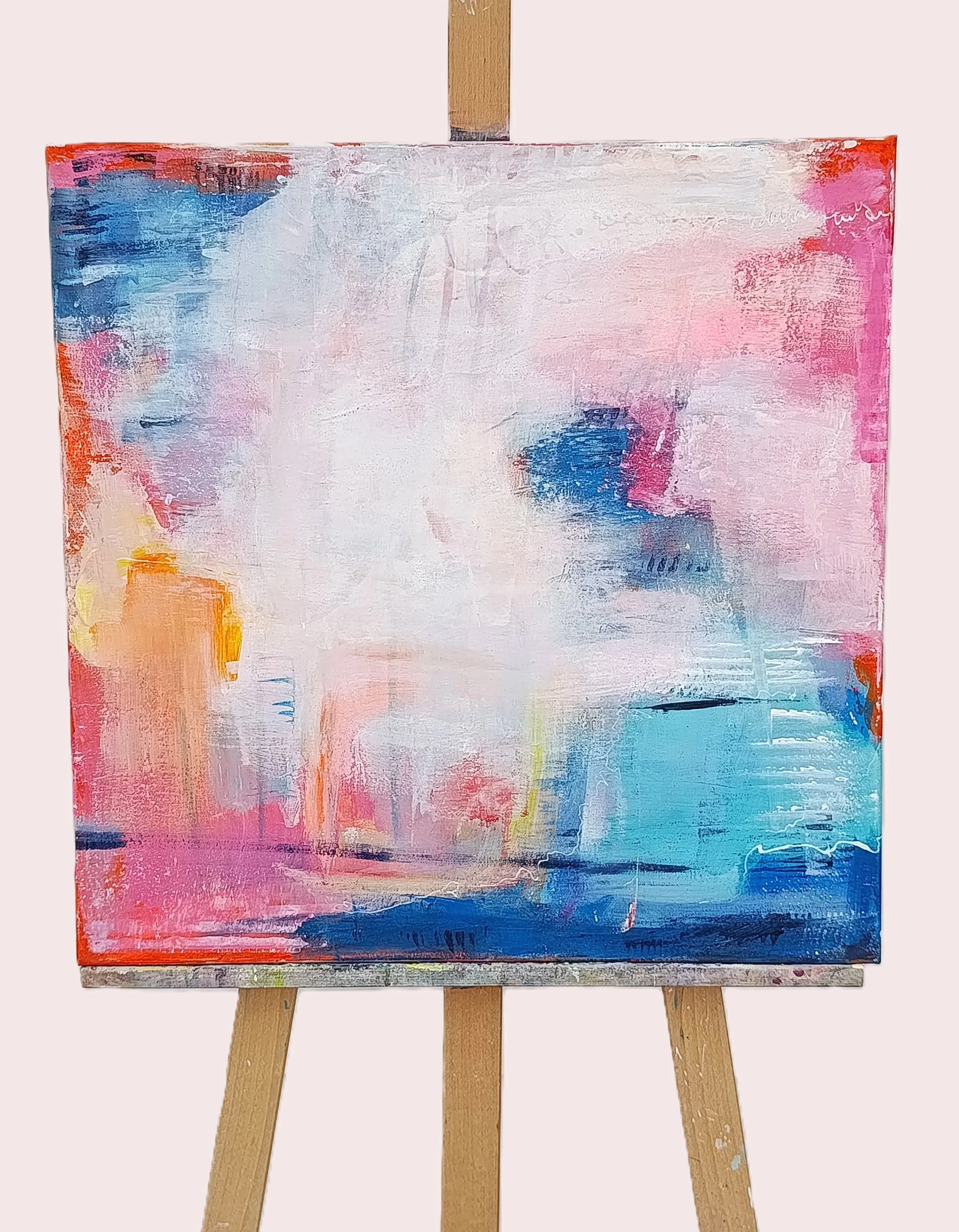 Joy & Glow – Original mixed media abstract painting, 50x50 cm, with vibrant colors and textured layers extending to the painted edges.