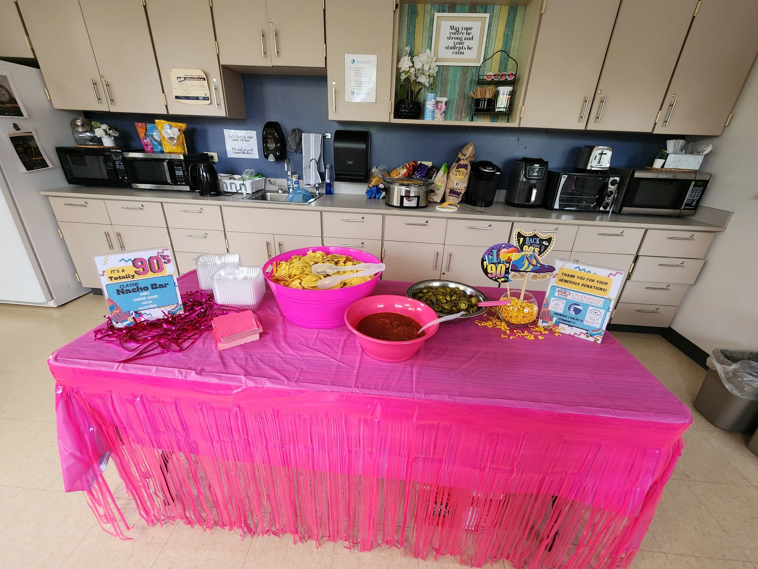Throwback Treats: We took it back to the '90s with a nacho bar, bright colors, and nostalgic fun. A simple way to make an ordinary workday feel special. It was rad. 
