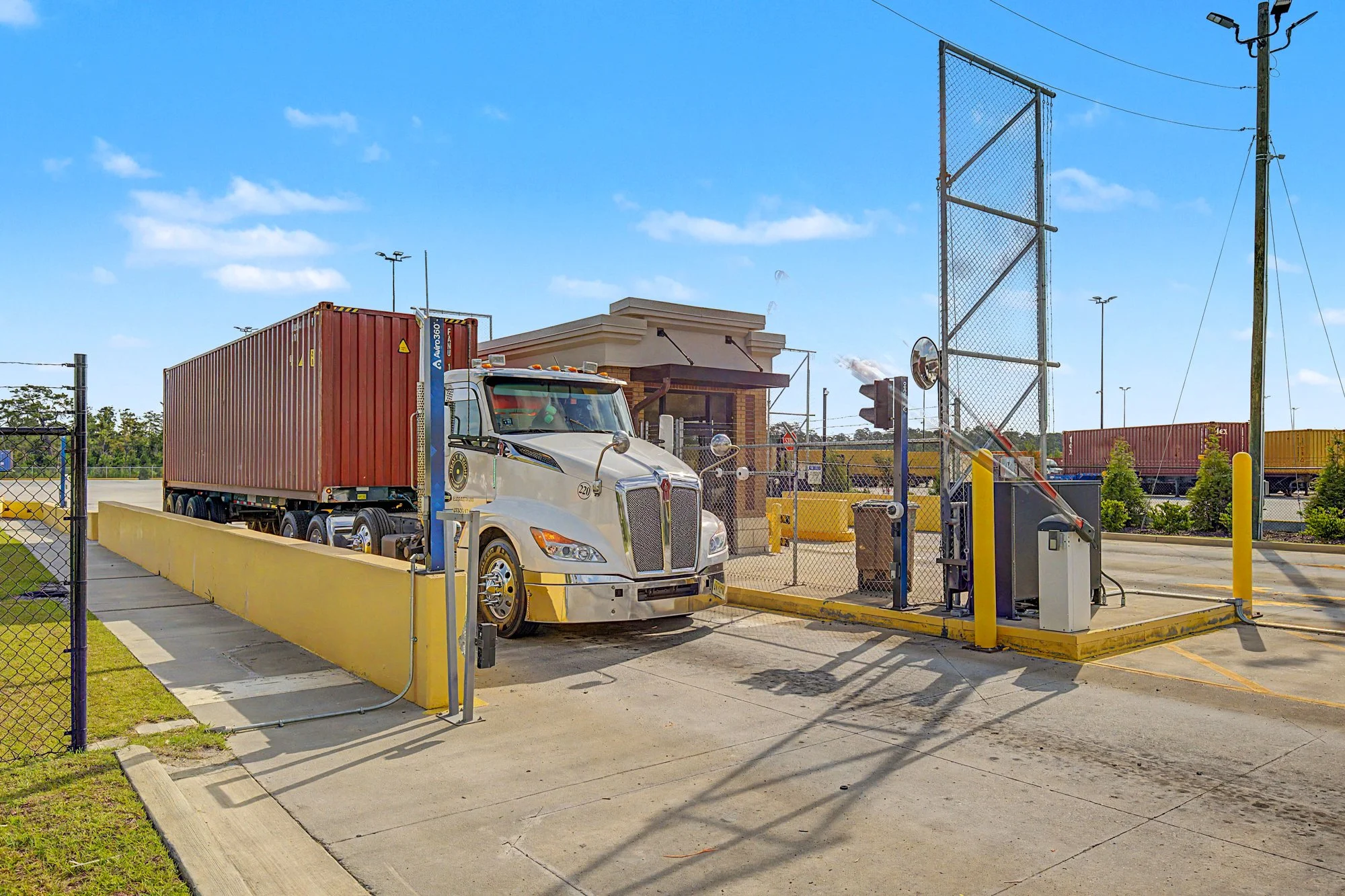 Semi-truck moves through secure, automated gates at Savannah Global Logistics Park