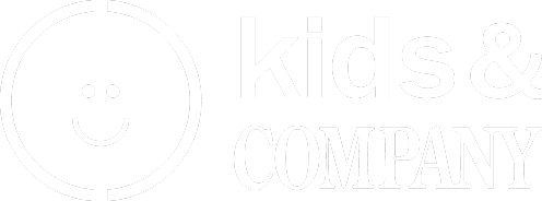 Logo for Kids & Company featuring a smiling face in a circle.