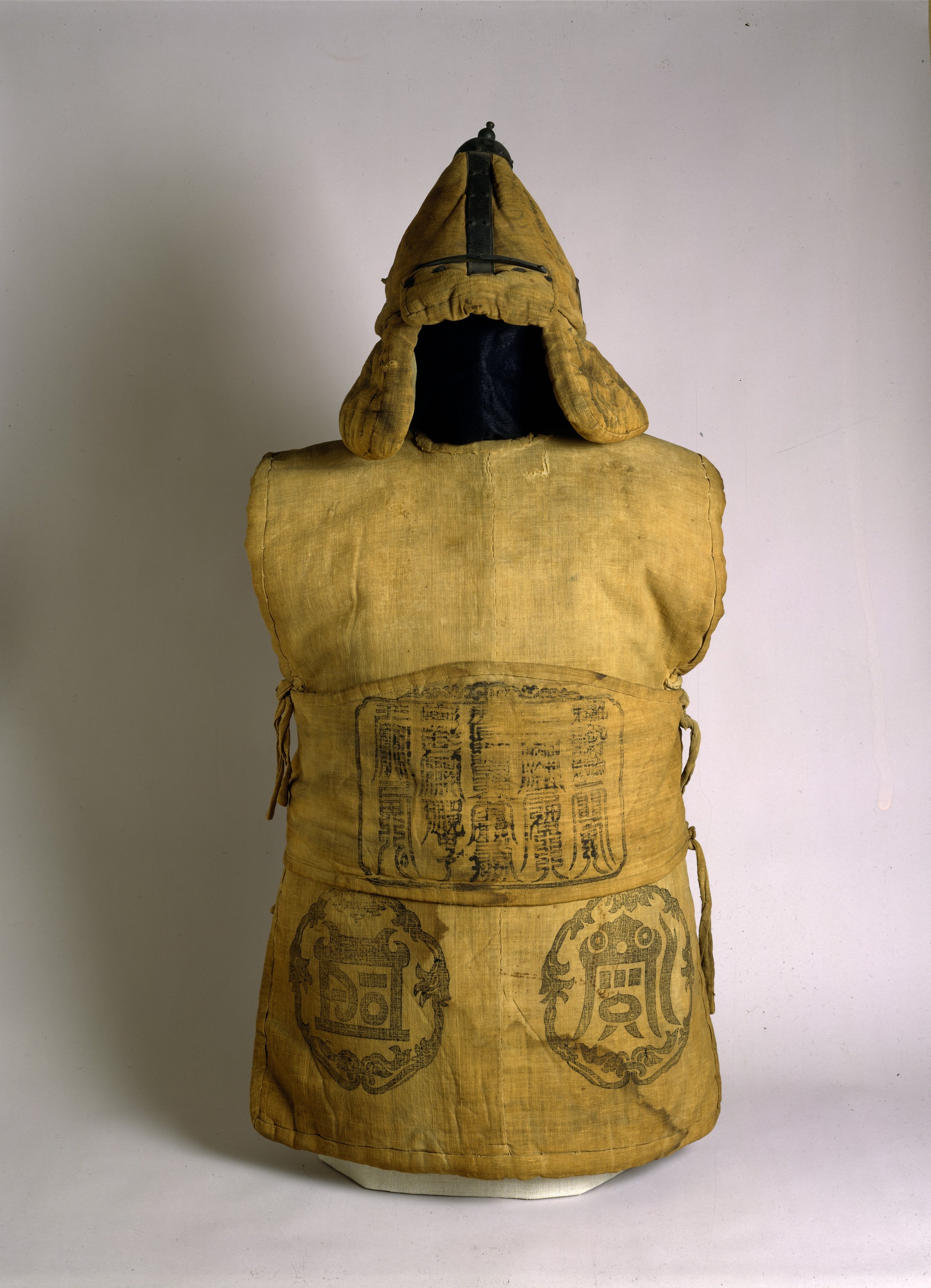 Fabric Armor and Helmet with Buddhist and Taoist symbols. Front View.