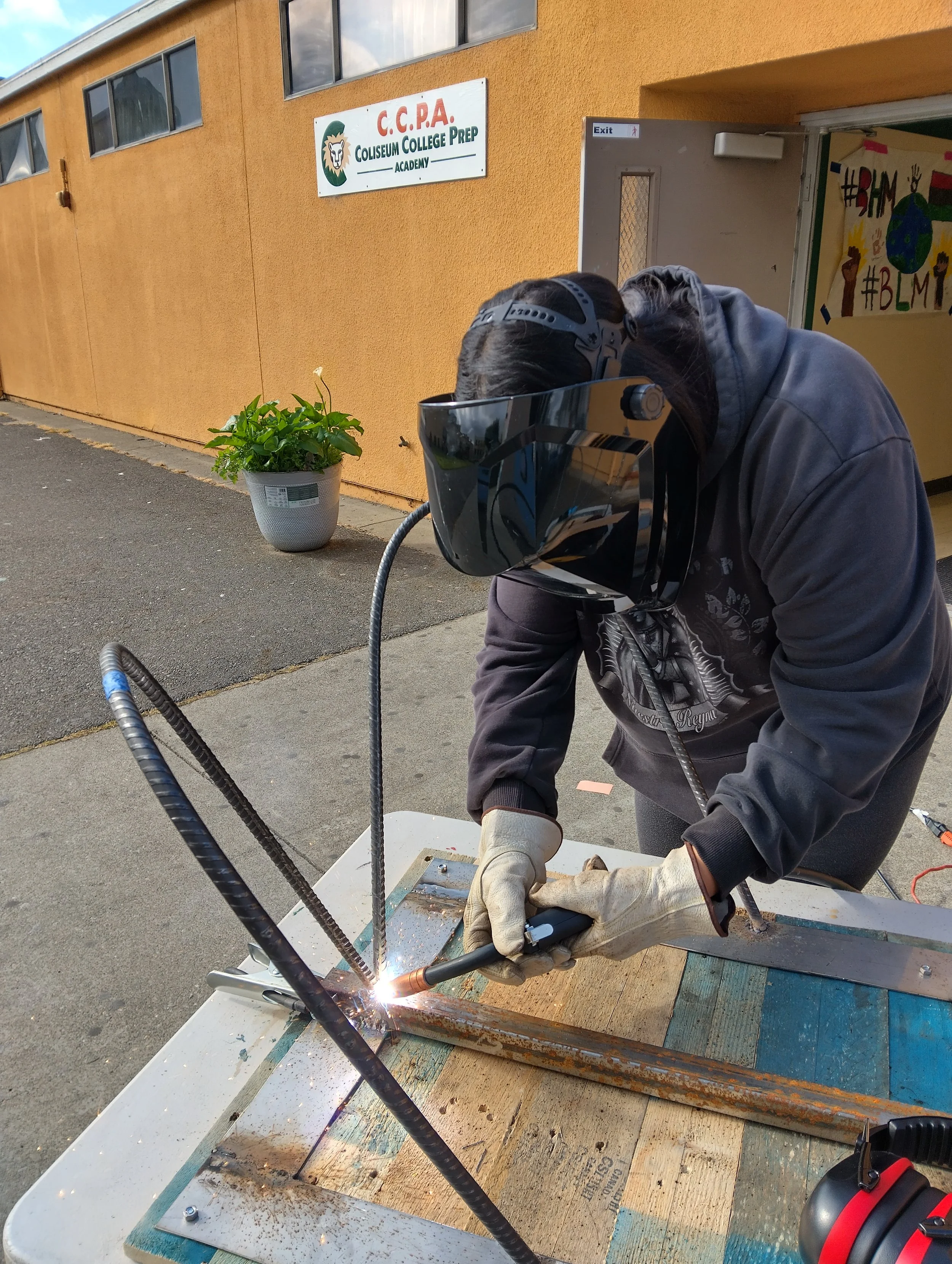 Student working on our new classroom coffee table.