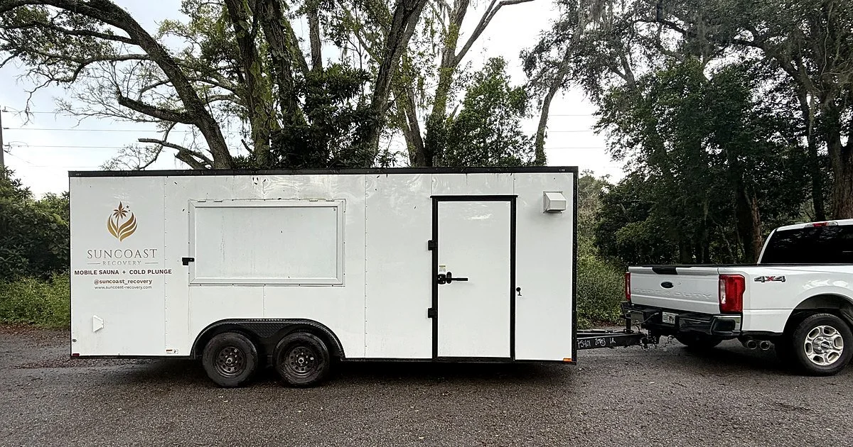 Suncoast Recovery mobile sauna and cold plunge trailer hitched and ready for an event in Tampa Bay FL