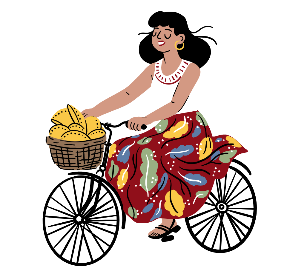 A woman with short dark hair, wearing a white sleeveless top and a colorful skirt with leaves and fruit patterns, sitting with a basket of yellow lemons