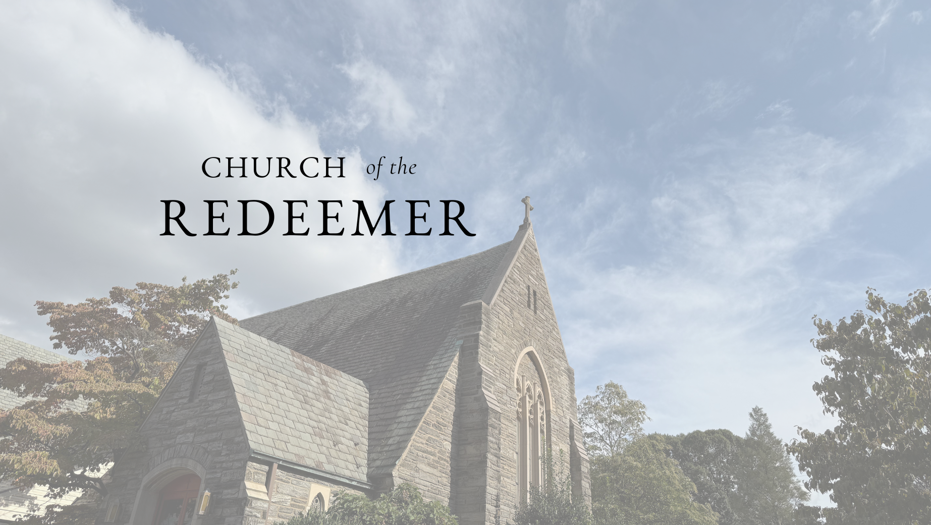 A stone church with a peaked roof and a cross on top, set against a background of trees and a partly cloudy sky, with the text "Church of the Redeemer" overlayed.