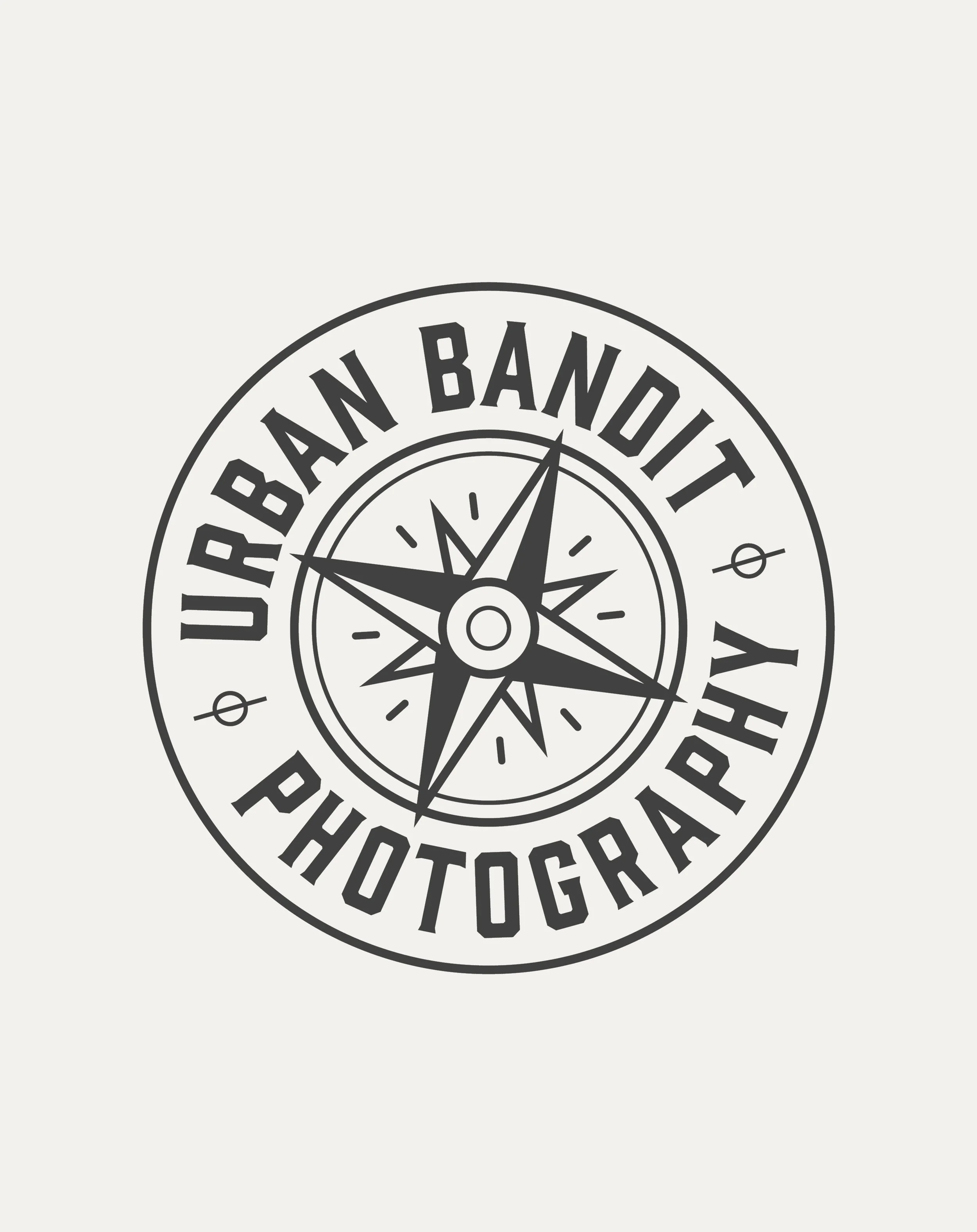 Circular logo with the words "URBAN BANDIT PHOTOGRAPHY" and a compass design.