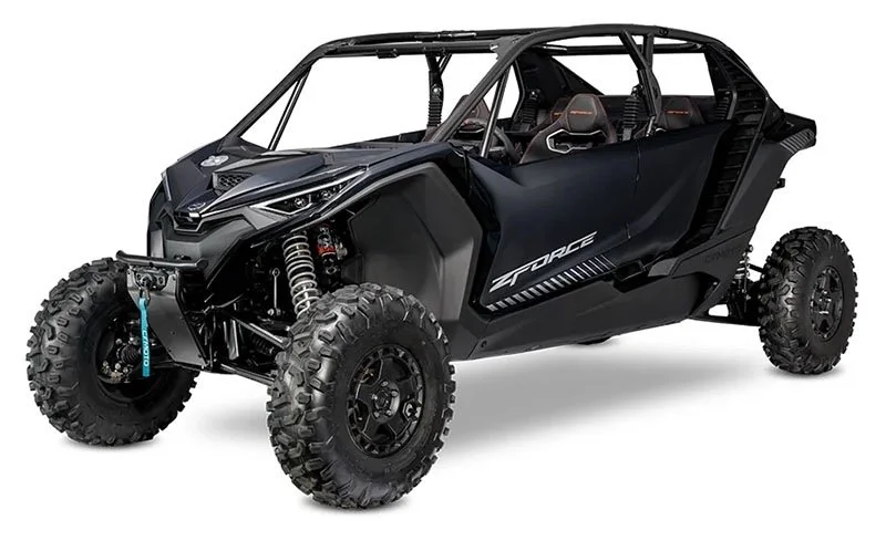 Black off-road side by Side utv vehicle with large tires and open cabin.