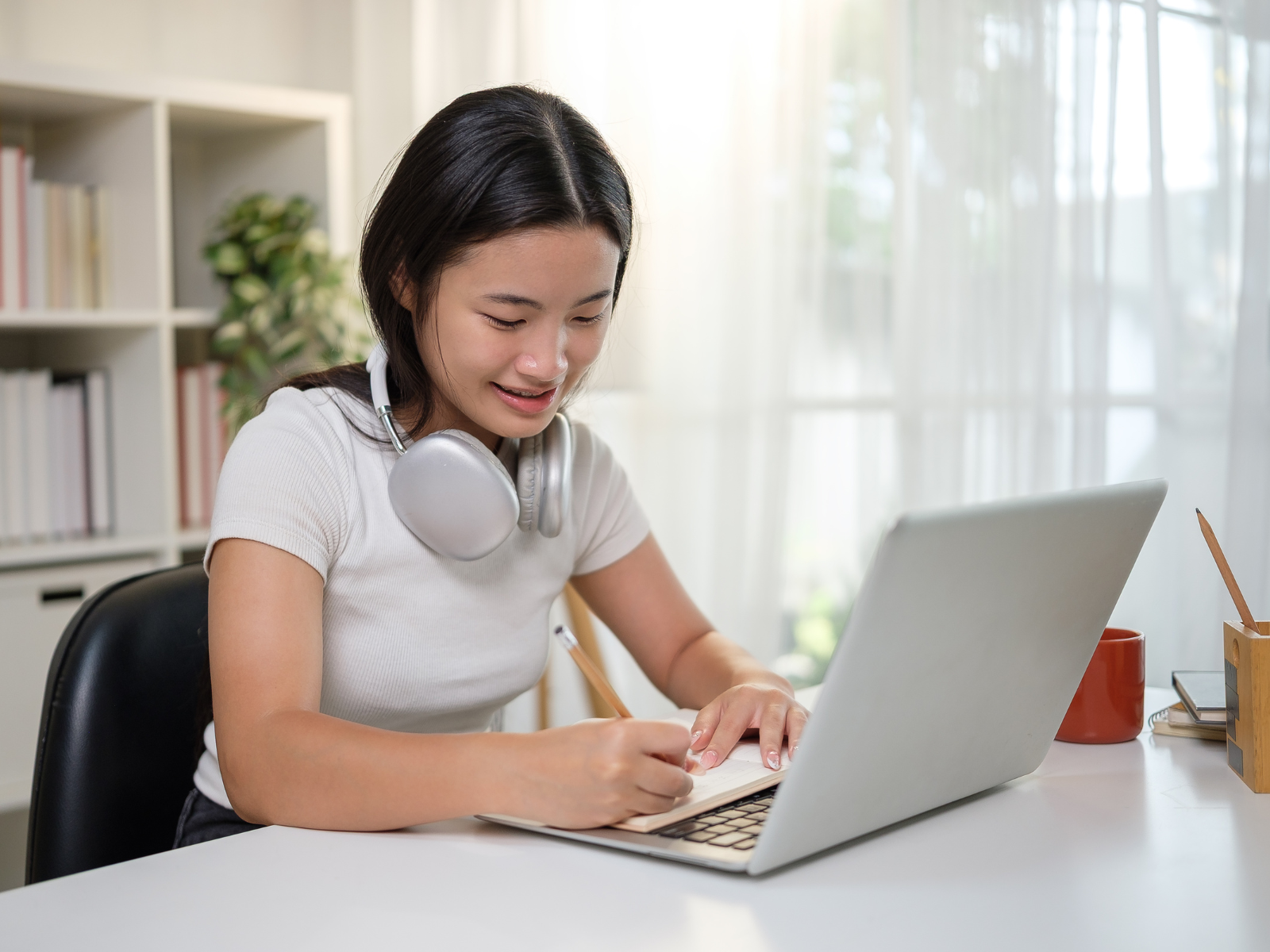 High School Homeschool Student learning online.
