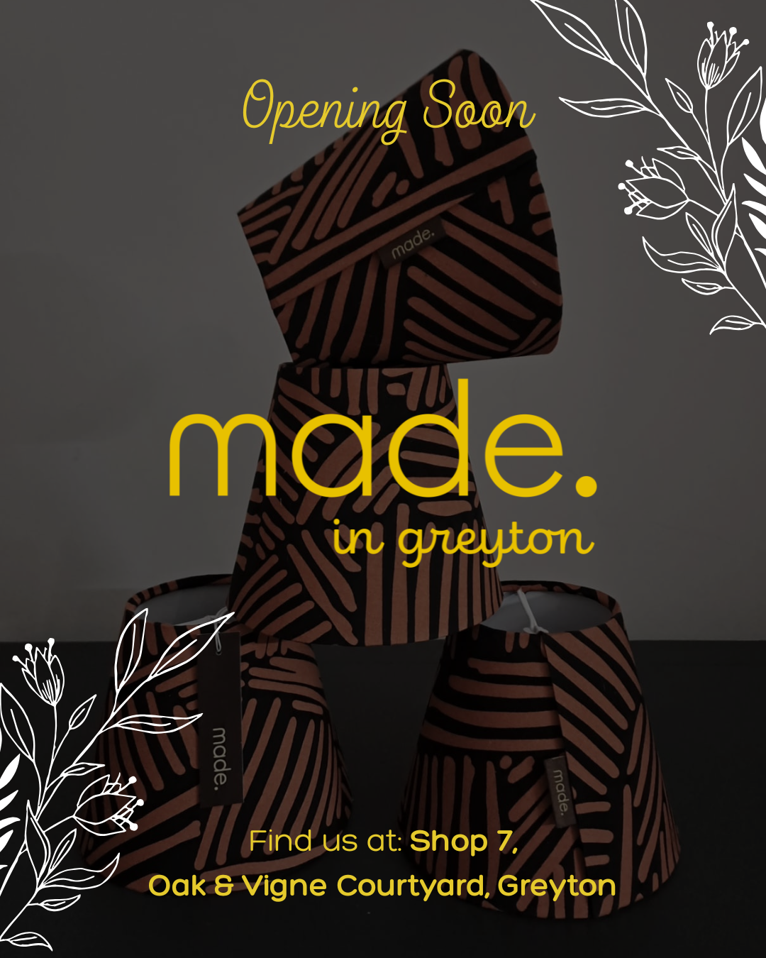 Promotional social media post with stacked lamp shades and text announcing an opening soon at Shop 7, Oak & Vigne Courtyard, Greytown. The background is dark with white floral outlines on the corners.