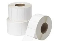 Blank white stock label rolls with cardboard cores for thermal printing applications.