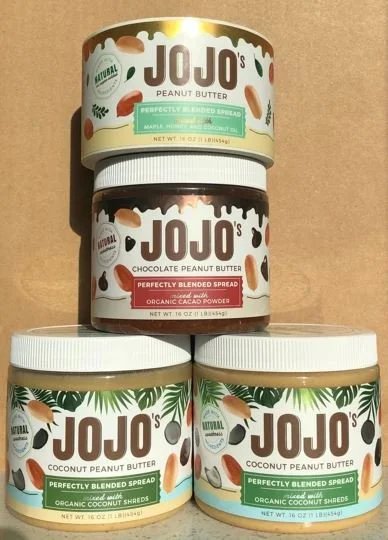 Custom product labels on JOJO’s peanut butter and coconut peanut butter jars.