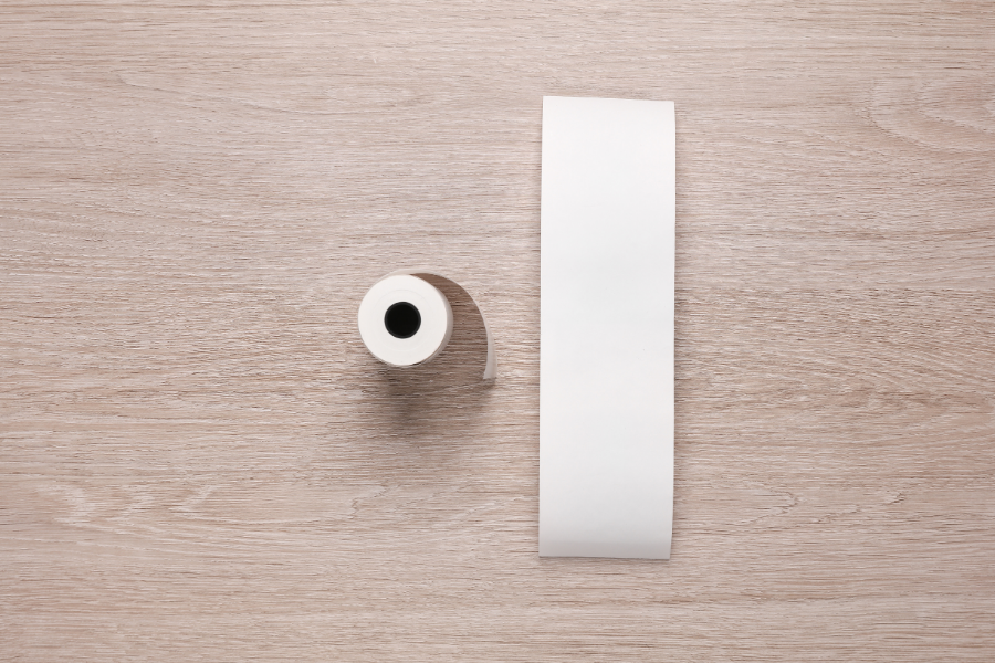 Handheld e-ticket paper roll for mobile parking enforcement printers.