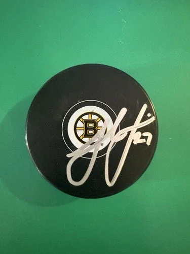 Hampus Lindholm Signed Puck with JSA Cert!