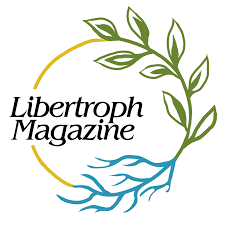 Logo of Libertroph Magazine featuring a green plant with roots, a gold arc, and blue water elements.