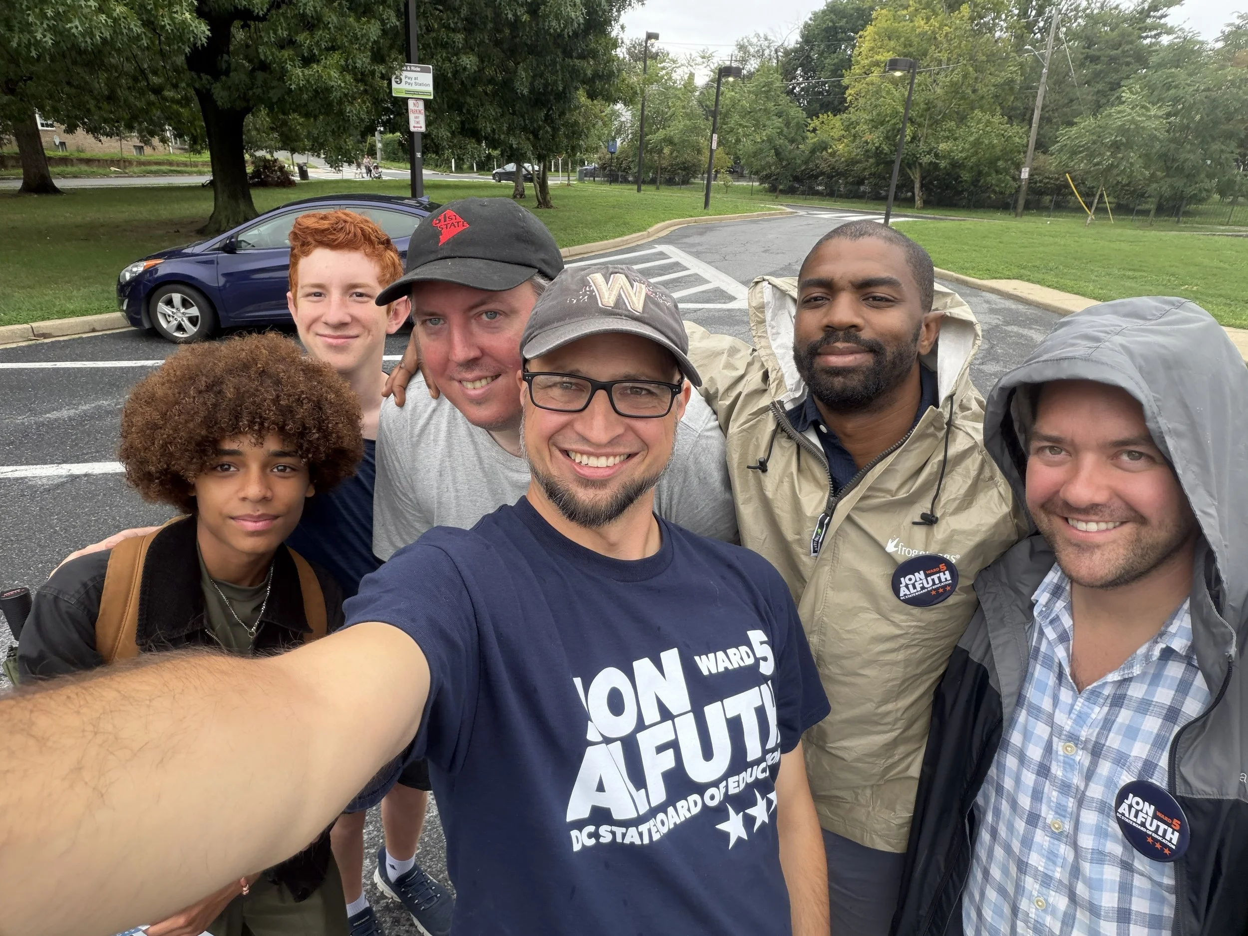 Jon, our campaign manager David, and several of our volunteers beating the rain canvassing in Brookland