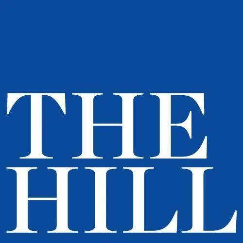 Blue square with white text reading "THE HILL" in large, capitalized letters.