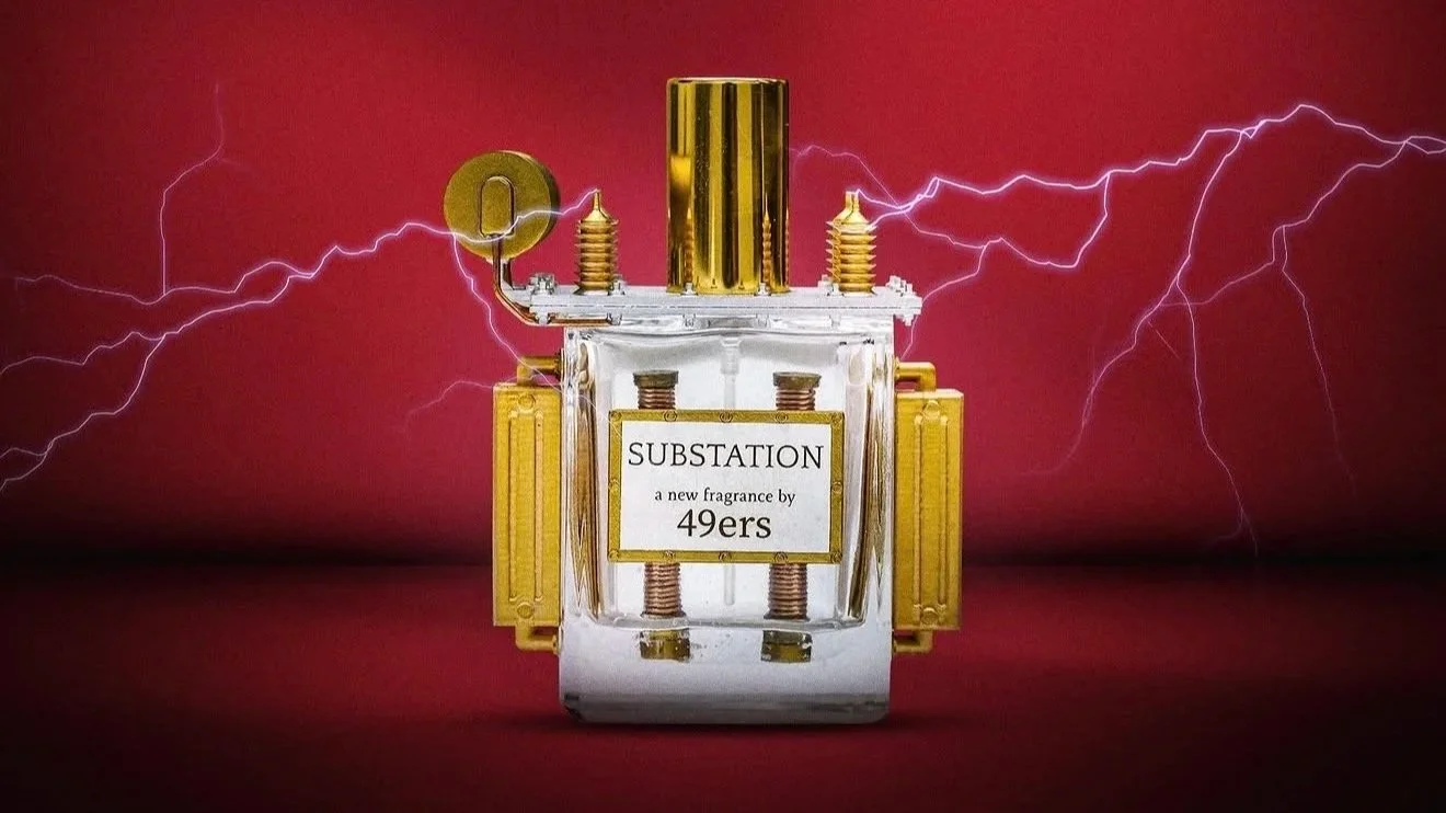 Perfume bottle labeled 'Substation, a new fragrance by 49ers' with lightning effects in the background.