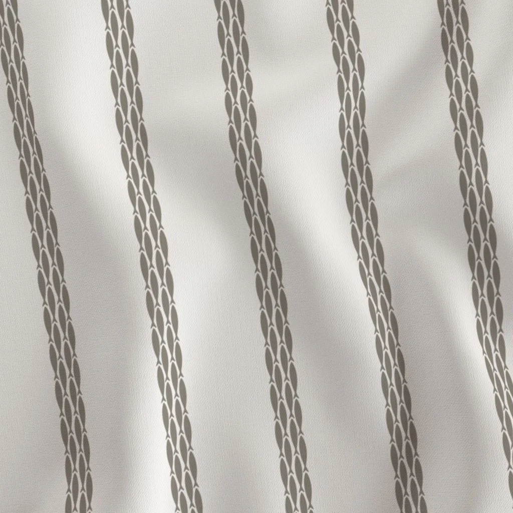 Close-up of a fabric with a pattern of vertical gray and white stripes, featuring a repeating chain-like design.