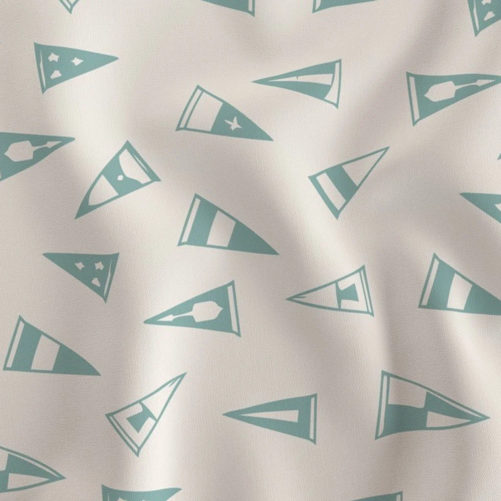 White fabric with a Teespring logo and chevron designs in teal color.