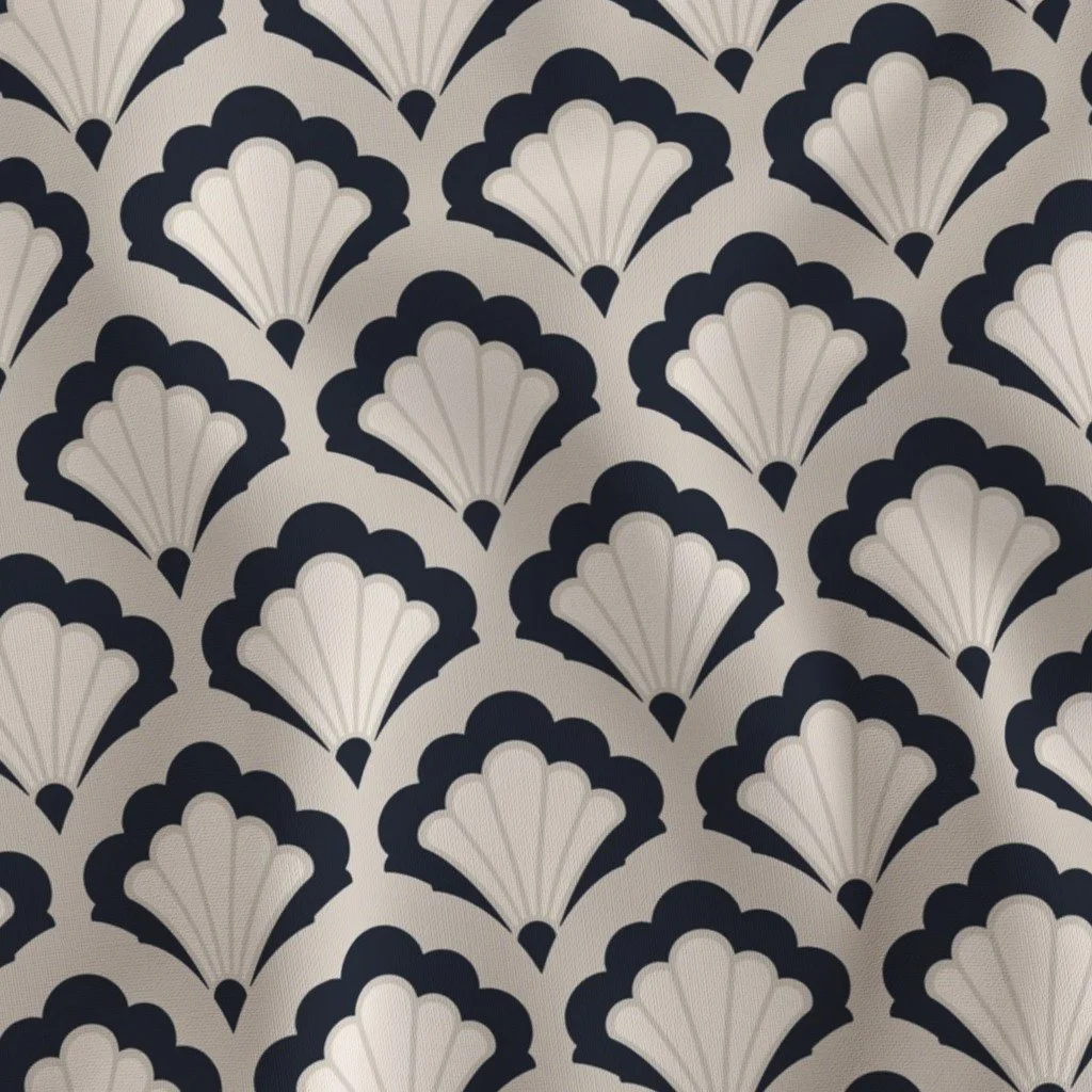 Pattern of stylized seashell motifs in navy blue and white, arranged in a repeating symmetrical design.