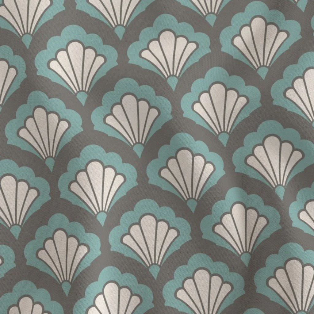 Pattern of stylized white and light blue fan shapes on a dark background