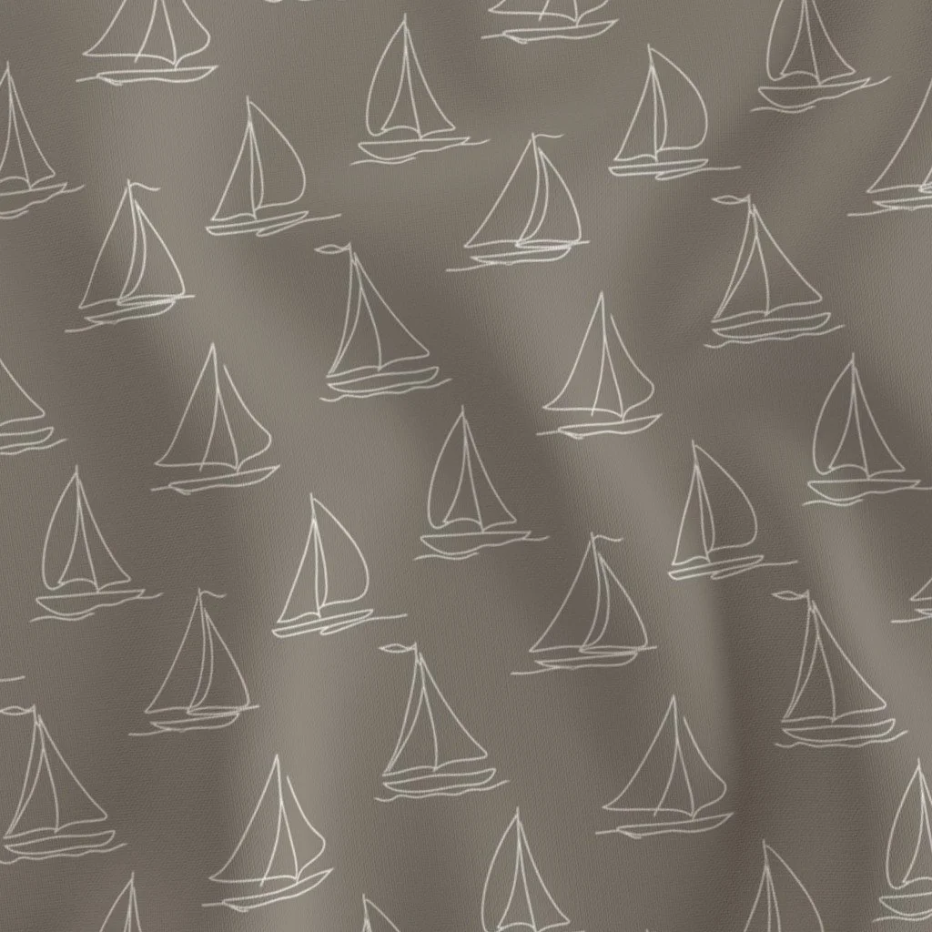 Pattern of white sailboats drawn with continuous lines on a gray fabric background.