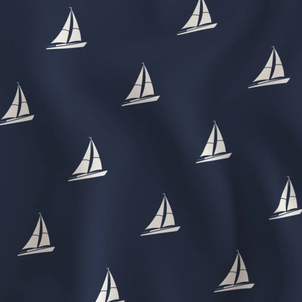 Pattern of white sailboats on a dark blue background.