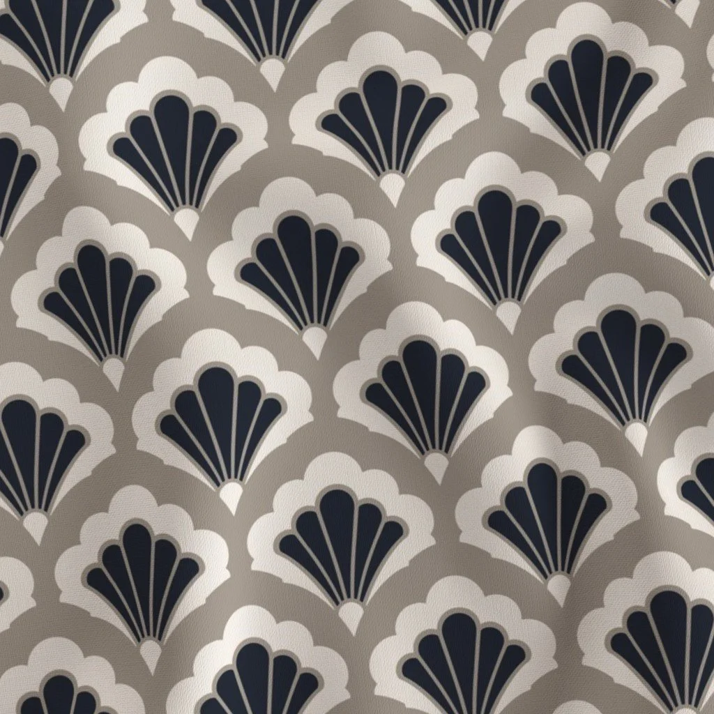 A repeating pattern of stylized fans or shells in black, white, and gray, arranged in a symmetrical, decorative design.