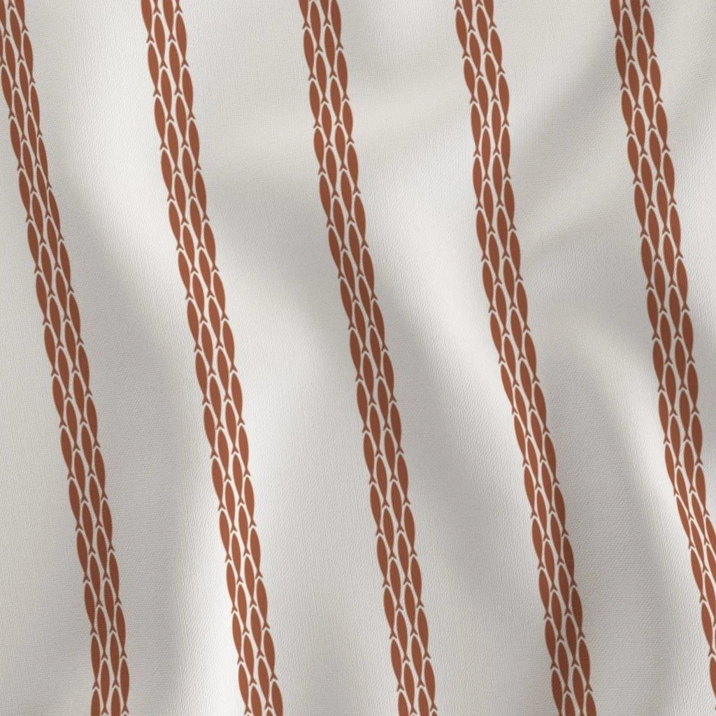 Close-up of a fabric with a white background and brown vertical striped pattern.