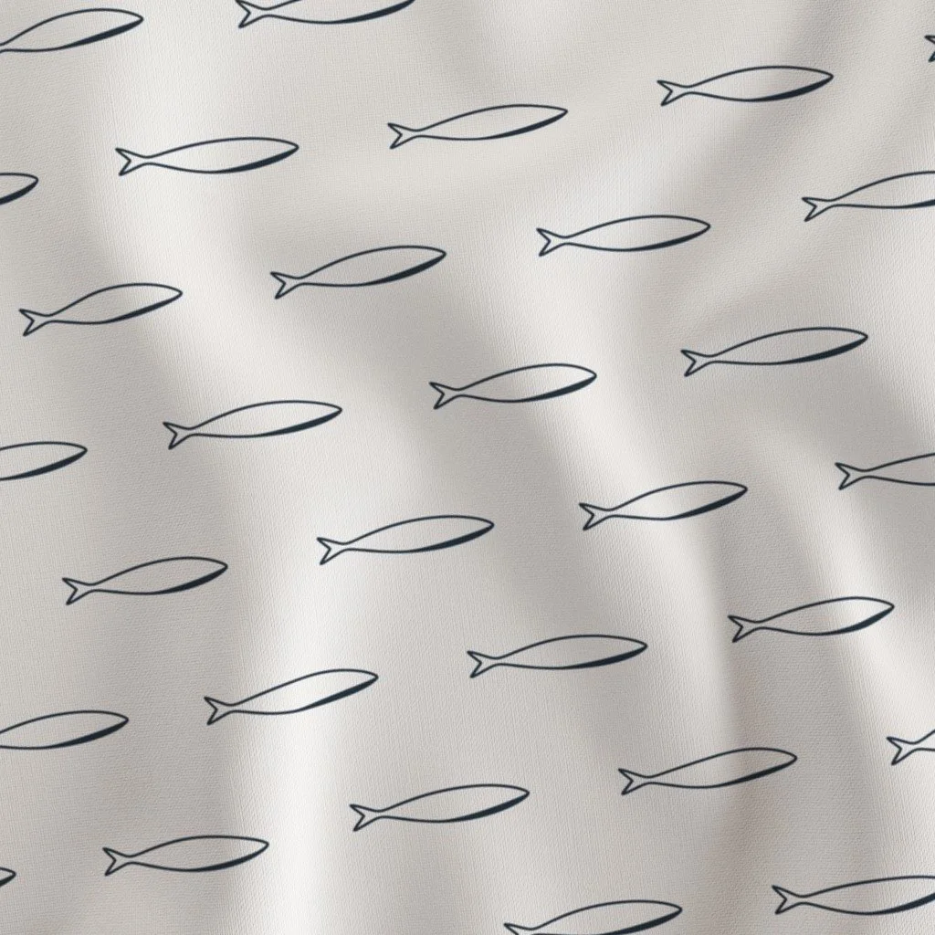A white fabric with a pattern of simple, black outline fish