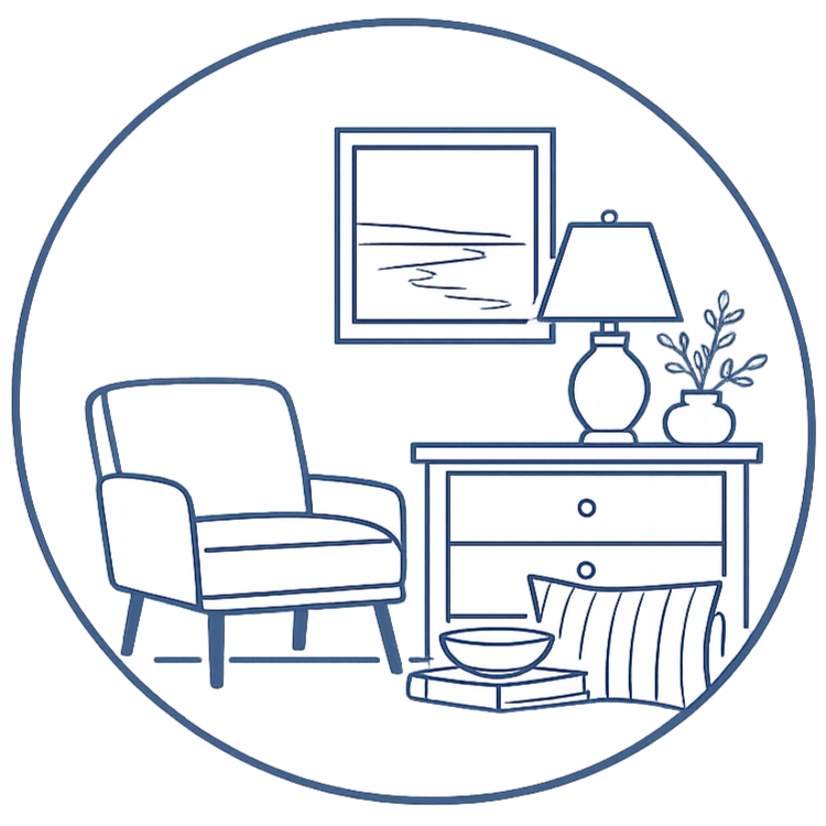 Line drawing of a cozy living room corner with an armchair, a chest of drawers with a lamp and potted plant on top, a framed picture on the wall, and a stack of books with a bowl in front.