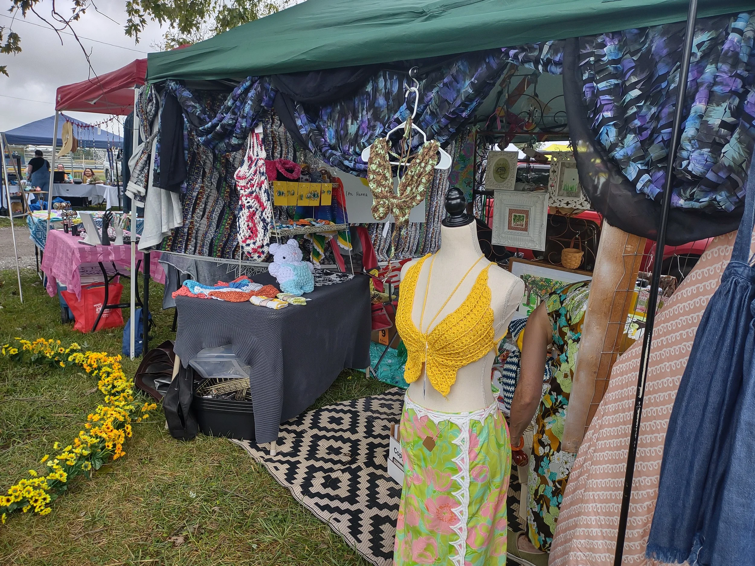Our booth, featuring some items I made (2024).
