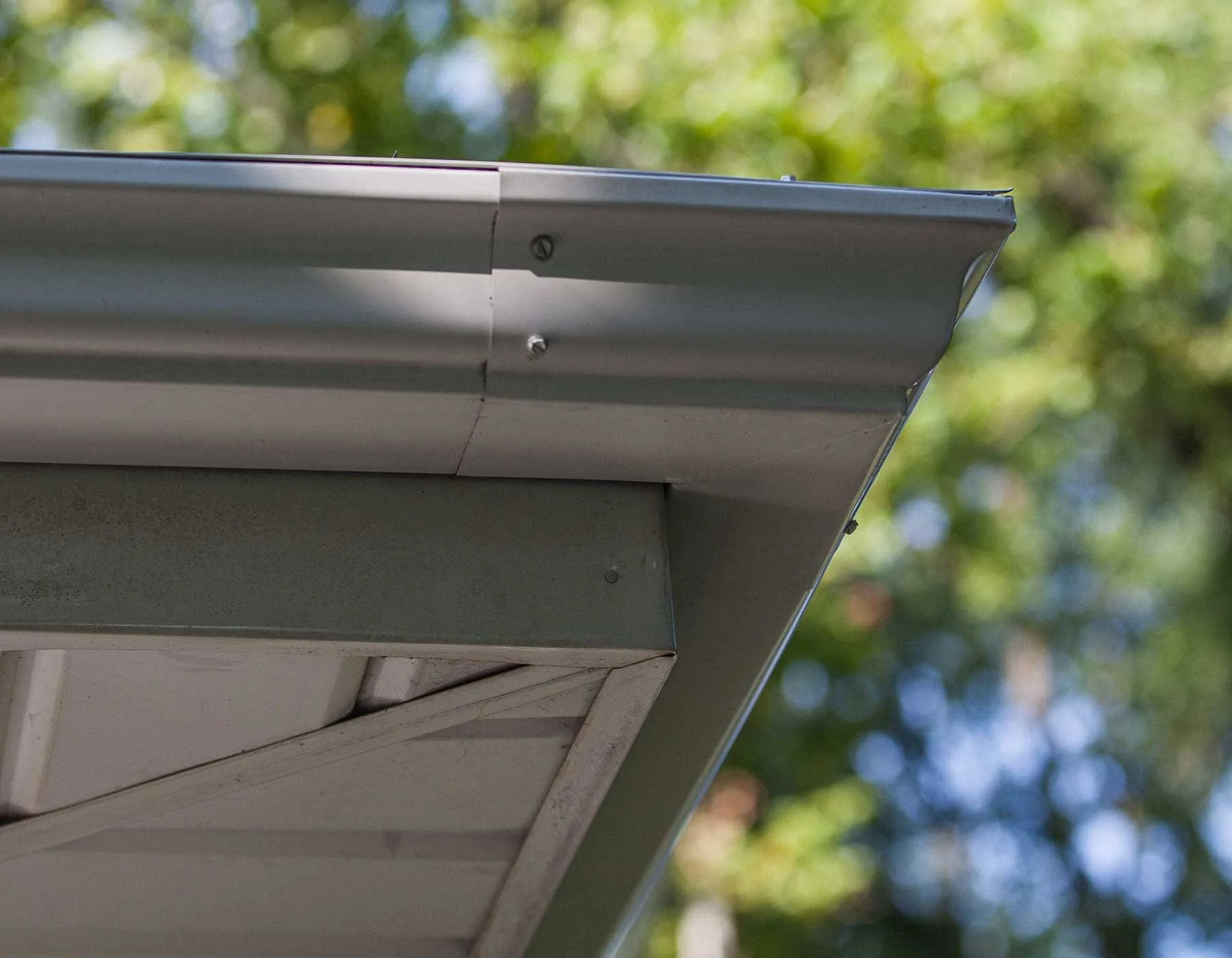 GutterRx is virtually invisible from the ground when looking up at the gutters