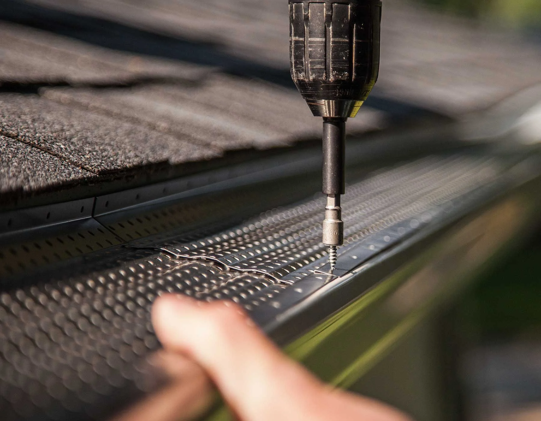 GutterRx strengthens the entire gutter system by being attached to the front and back of the gutter.