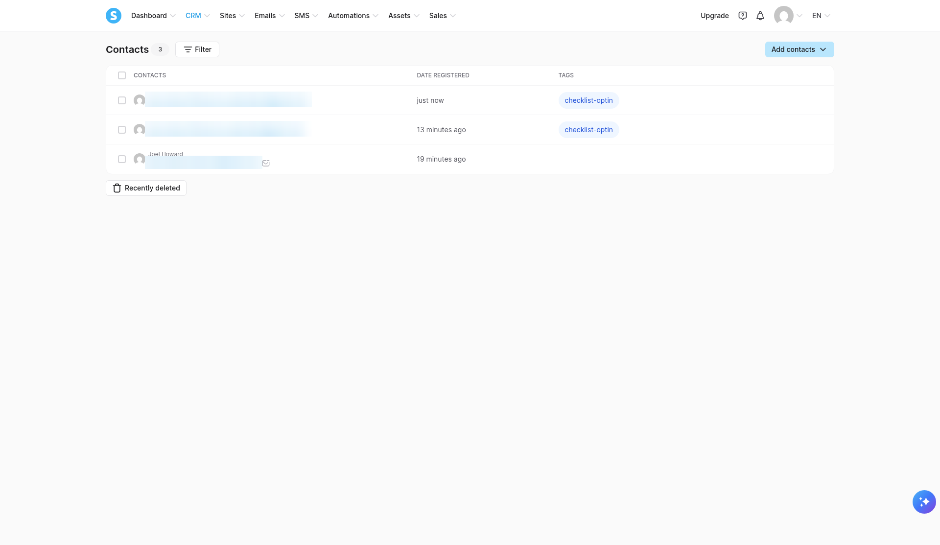 Systeme.io contacts list showing our test sign-ups tagged checklist-optin (email addresses blurred)
