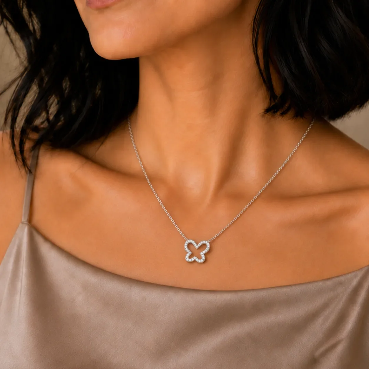 White gold lab-grown diamond butterfly necklace worn