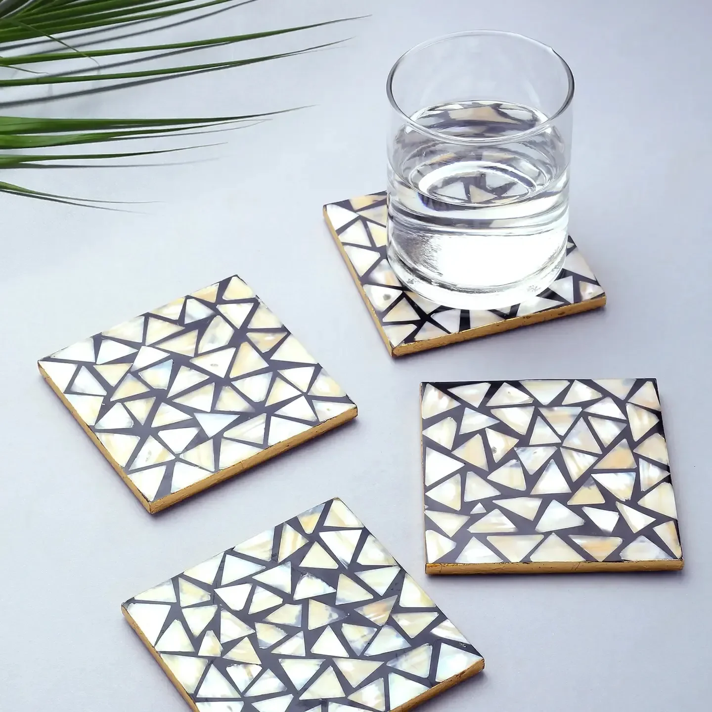 Mother-of-pearl coaster set styled on table