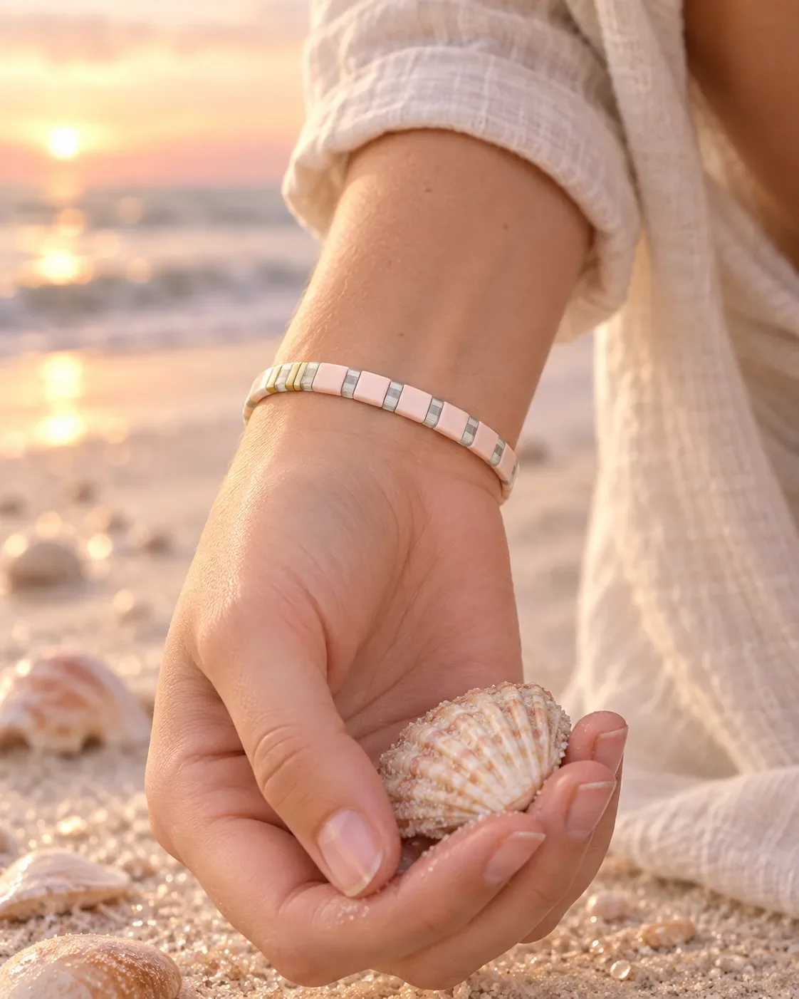 Seashell Tila bead bracelet worn on wrist