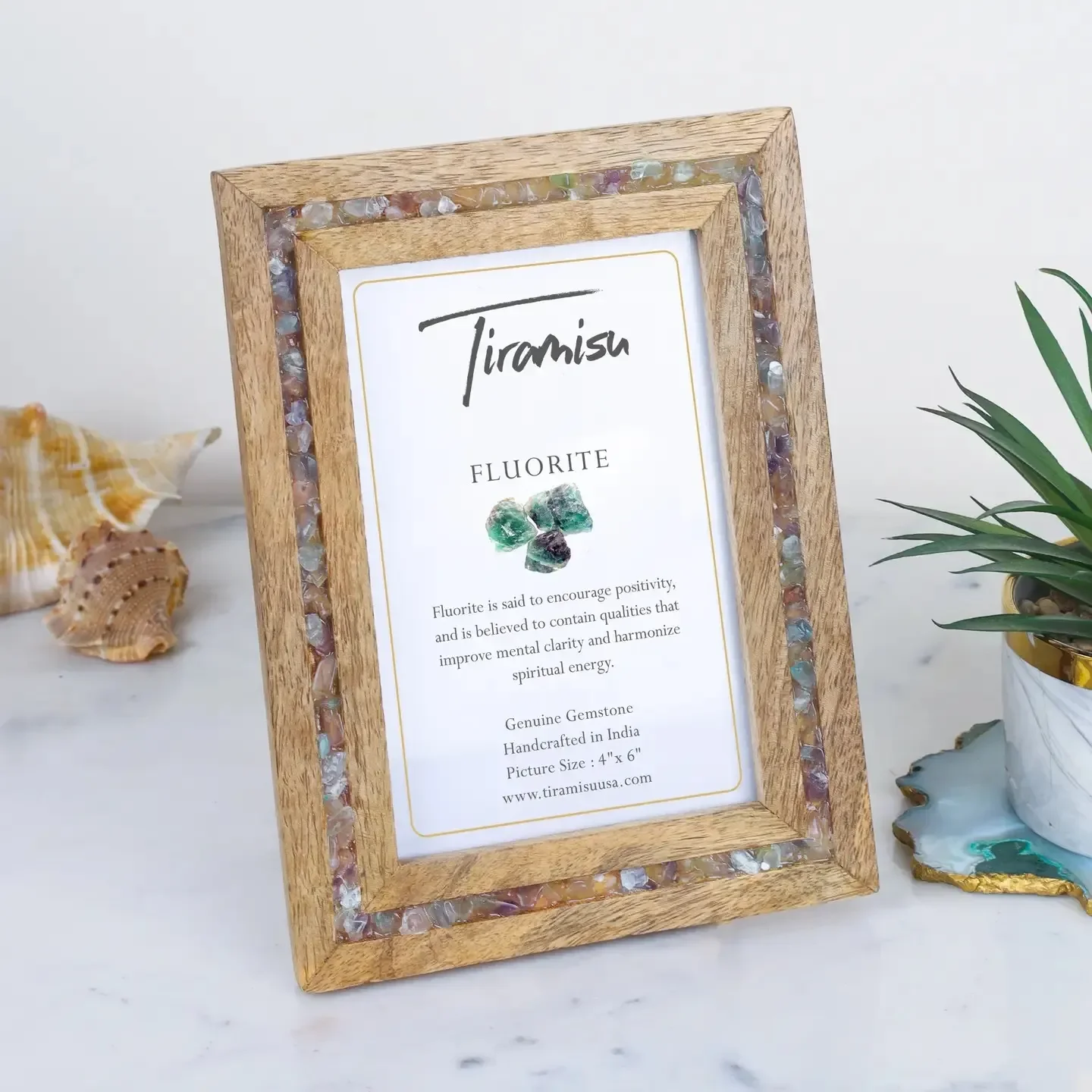 Fluorite gemstone picture frame styled with photo