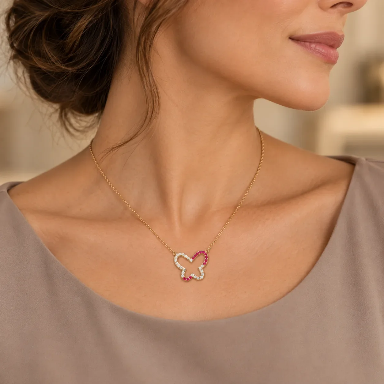 Ruby cut-out butterfly necklace worn