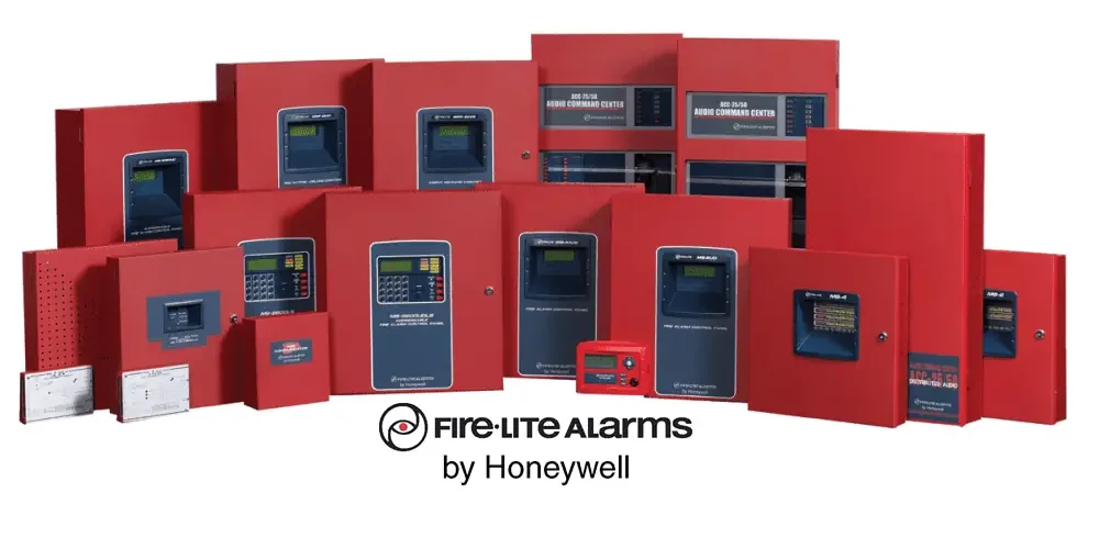 Collection of red fire alarm control panels and devices by Honeywell on a white background.