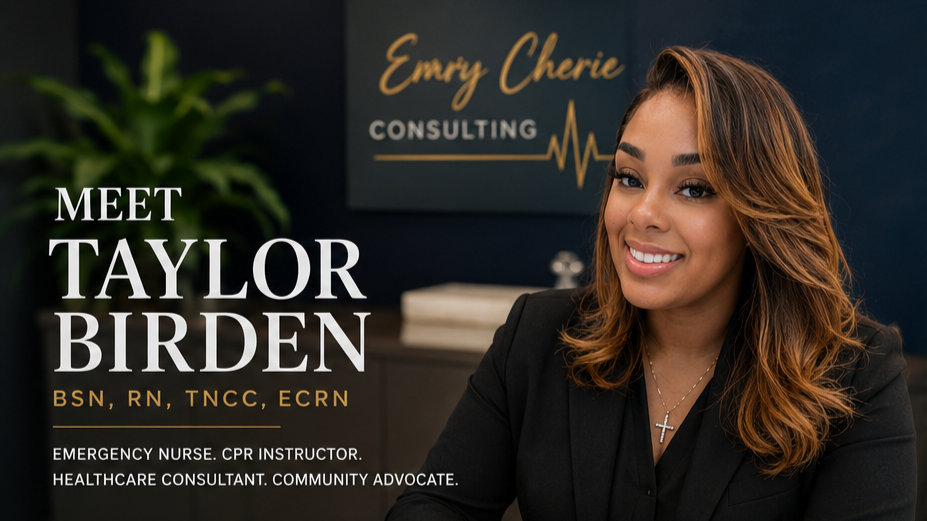Portrait of a smiling woman with shoulder-length wavy hair, wearing a black blazer and a cross necklace, sitting in a professional office setting with a sign that reads "Emry Cherie Consulting" in the background.